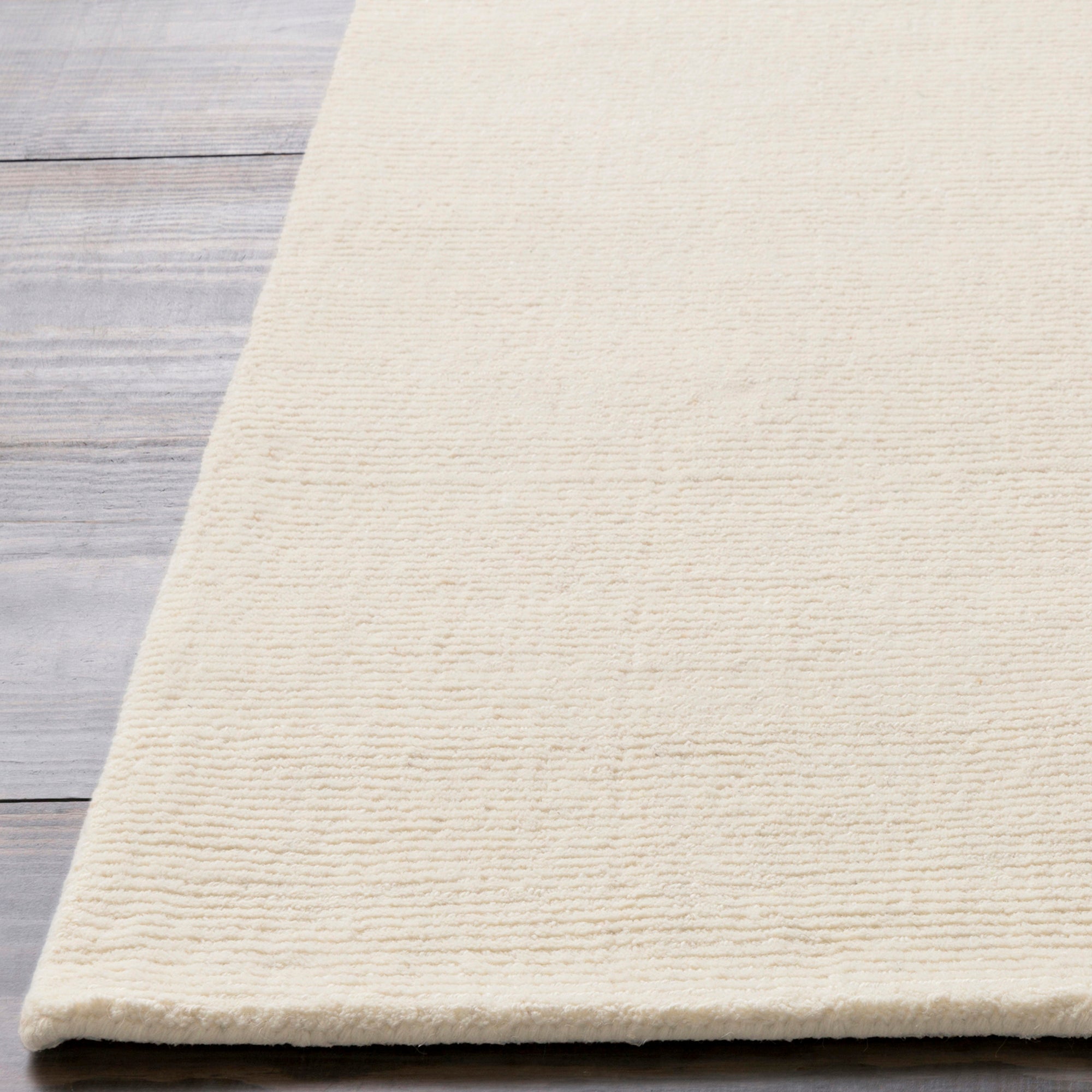 MITHILA Hand-Loomed Modern Wool Cream Area Rug
